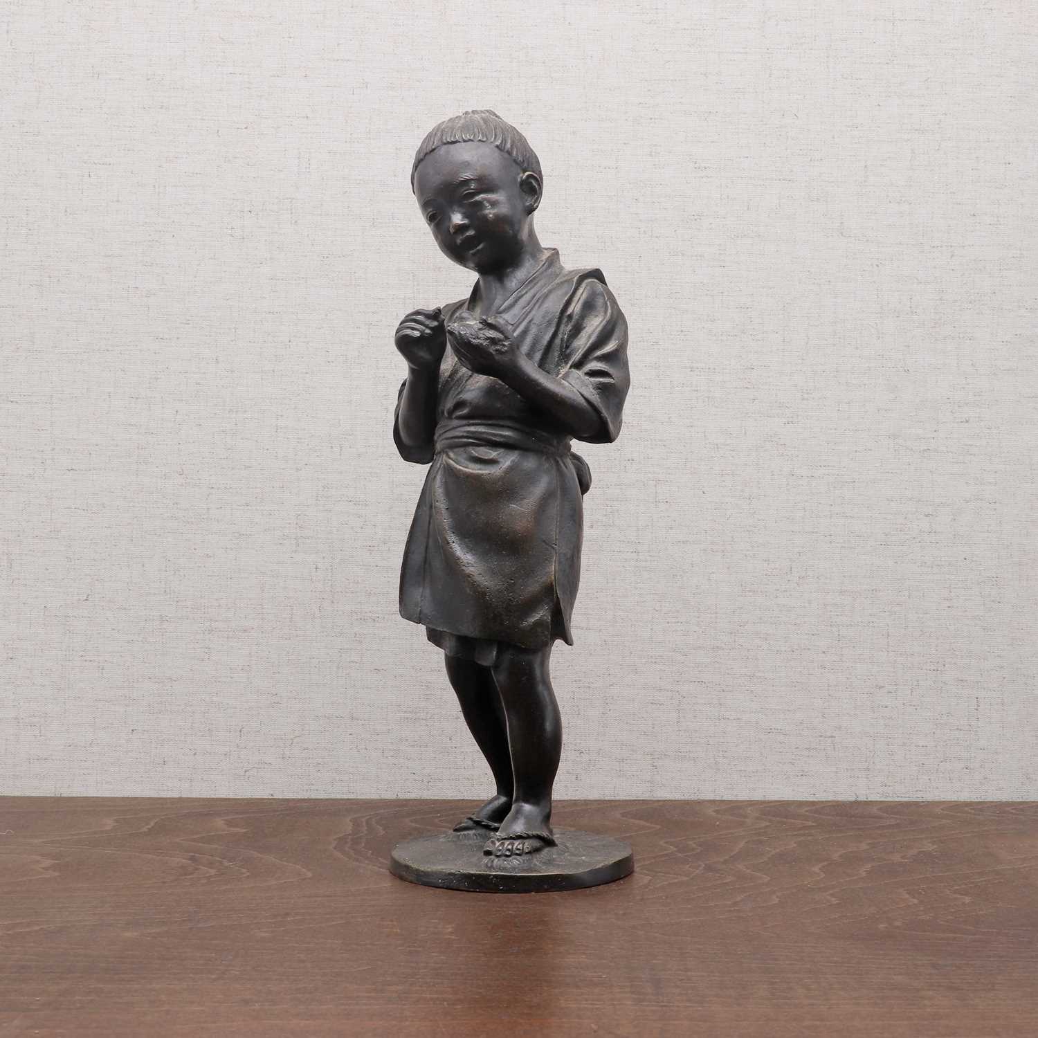 Lot 307 - A Japanese bronze okimono