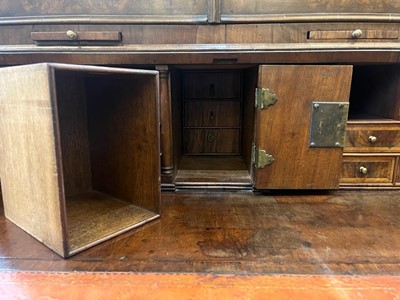 Lot 67 - A George I walnut bureau bookcase in the manner of Coxed & Woster