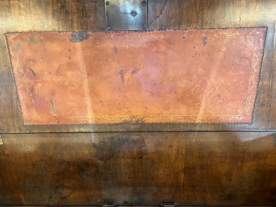 Lot 67 - A George I walnut bureau bookcase in the manner of Coxed & Woster