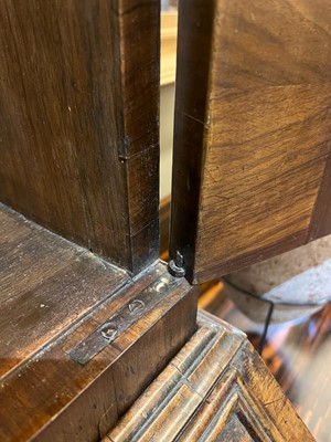 Lot 67 - A George I walnut bureau bookcase in the manner of Coxed & Woster