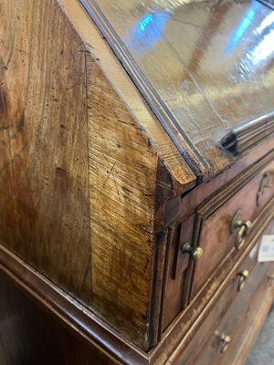 Lot 67 - A George I walnut bureau bookcase in the manner of Coxed & Woster