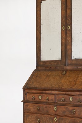 Lot 67 - A George I walnut bureau bookcase in the manner of Coxed & Woster
