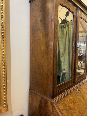 Lot 67 - A George I walnut bureau bookcase in the manner of Coxed & Woster