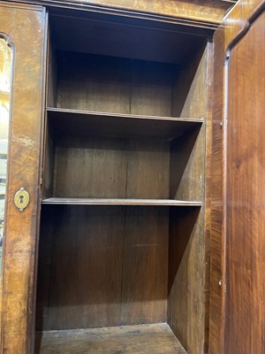 Lot 67 - A George I walnut bureau bookcase in the manner of Coxed & Woster