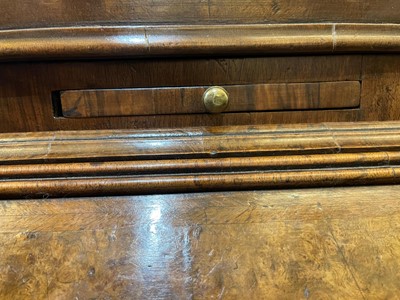 Lot 67 - A George I walnut bureau bookcase in the manner of Coxed & Woster