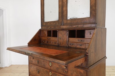 Lot 67 - A George I walnut bureau bookcase in the manner of Coxed & Woster