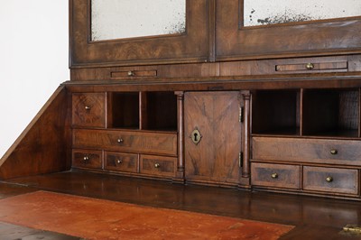 Lot 67 - A George I walnut bureau bookcase in the manner of Coxed & Woster