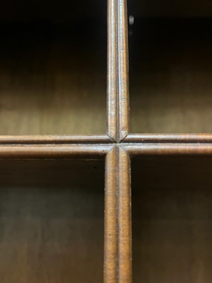Lot 67 - A George I walnut bureau bookcase in the manner of Coxed & Woster
