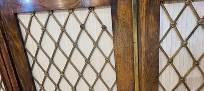 Lot 7 - A George IV rosewood side cabinet in the manner of Gillows