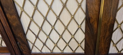 Lot 7 - A George IV rosewood side cabinet in the manner of Gillows