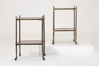 Lot 60 - A pair of Regency-style mahogany and brass étagères
