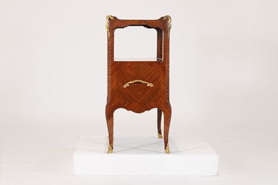 Lot 74 - A Louis XV-style kingwood étagère