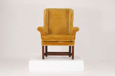 Lot 85 - A George III-style mahogany wingback armchair