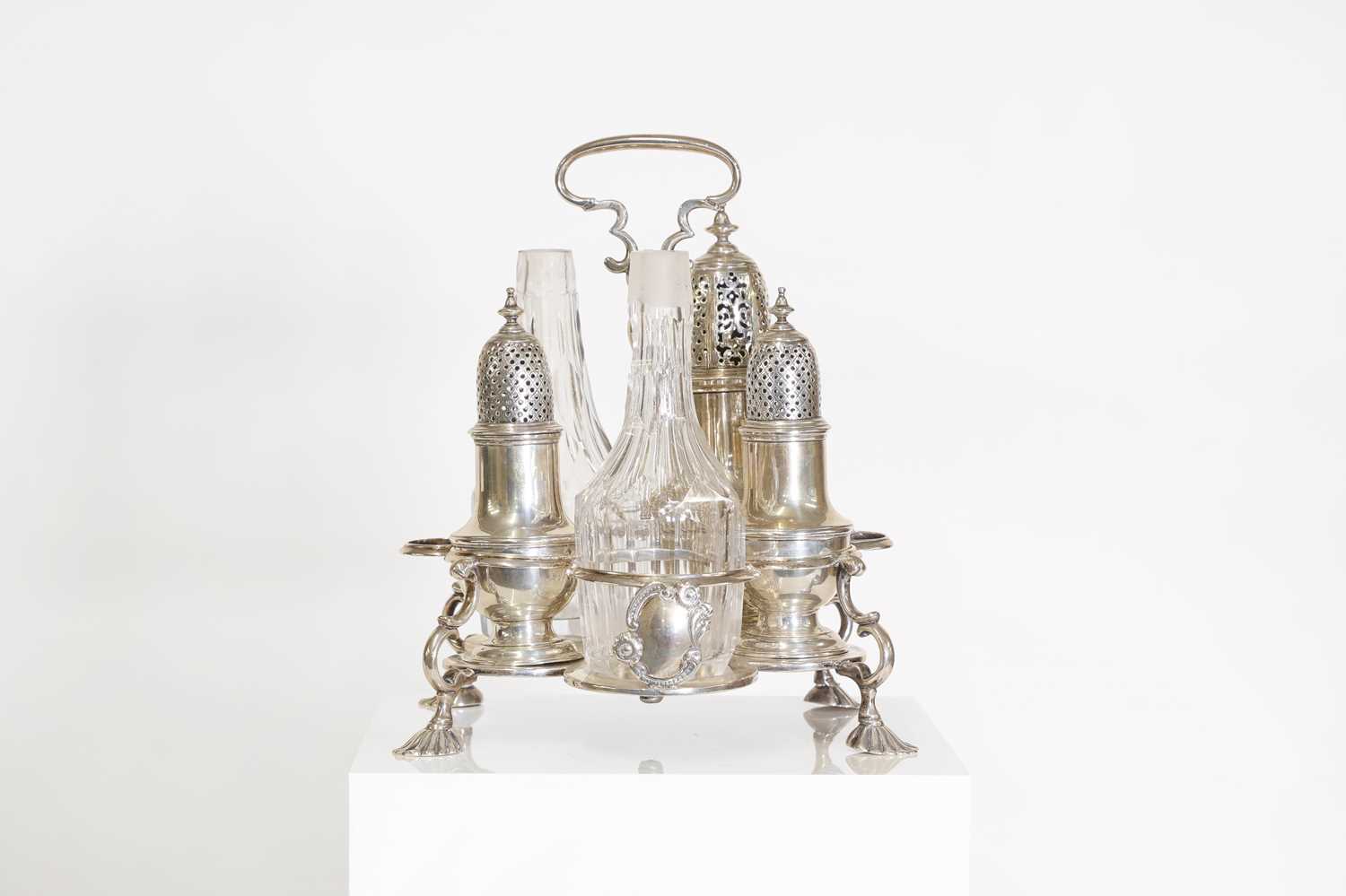 Lot 21 - A George II silver and cut-glass cruet set