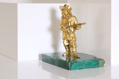 Lot 72 - A gilt-bronze figure of a musician