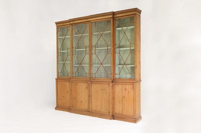 Lot 120 - A George III pine breakfront library bookcase