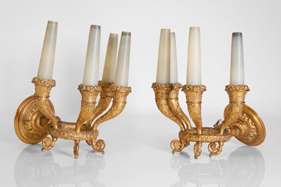 Lot 131 - A pair of Directoire ormolu four-light wall appliqués