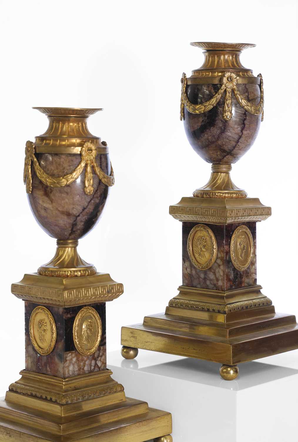 Lot 30 - A pair of George III Derbyshire Blue John and ormolu 'Cleopatra' candle vases