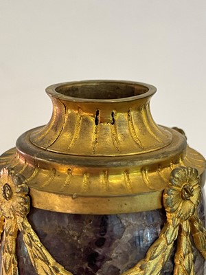 Lot 30 - A pair of George III Derbyshire Blue John and ormolu 'Cleopatra' candle vases