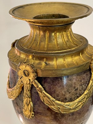 Lot 30 - A pair of George III Derbyshire Blue John and ormolu 'Cleopatra' candle vases