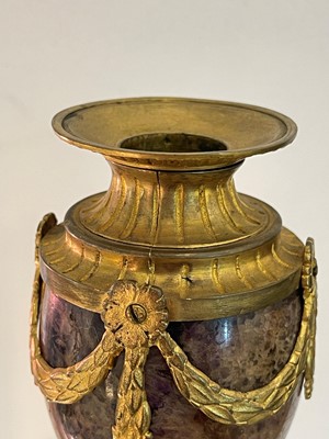 Lot 30 - A pair of George III Derbyshire Blue John and ormolu 'Cleopatra' candle vases