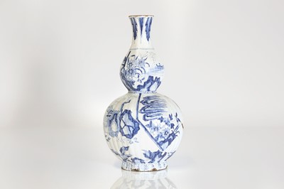 Lot 37 - A delft tin-glazed earthenware double gourd vase