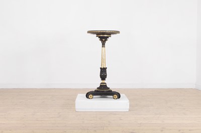 Lot 205 - A Regency gilt and ebonised wood and gesso torchère