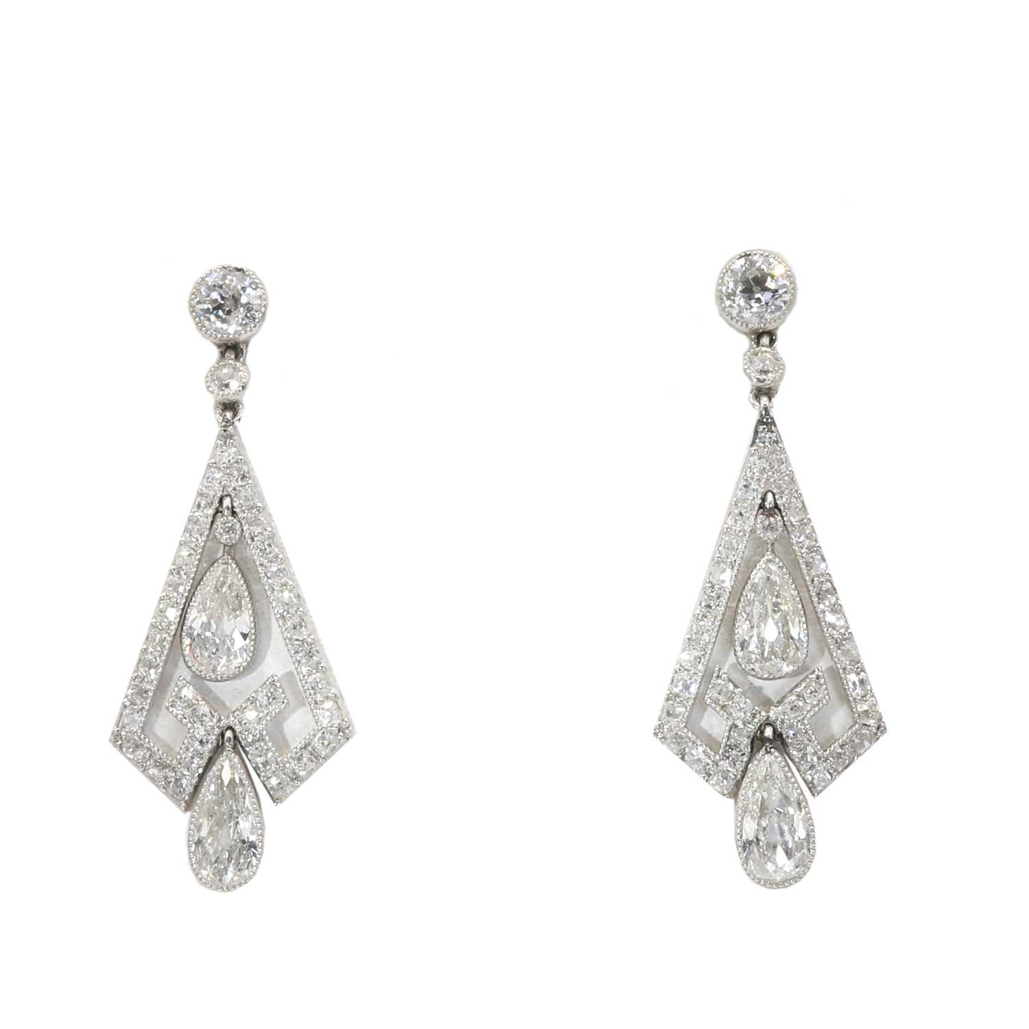 Lot 42 - A pair of Art Deco diamond pendant earrings