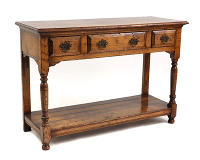 Lot 643 - An oak dresser base