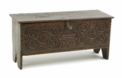 Lot 403 - A small boarded oak chest