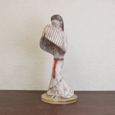Lot 36 - A Chinese pottery figure