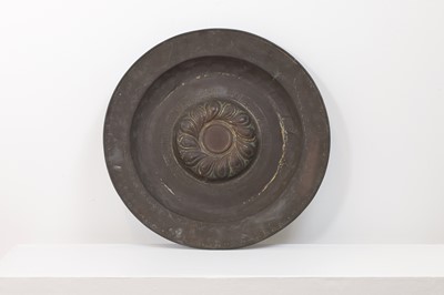 Lot 565 - A Nuremburg brass alms dish