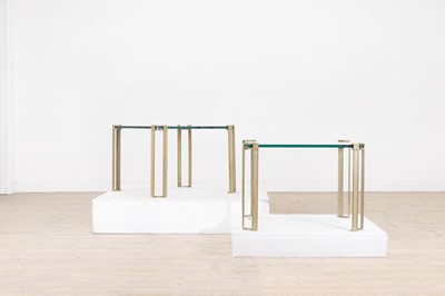 Lot 162 - A pair of modernist brass side tables