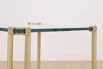 Lot 162 - A pair of modernist brass side tables