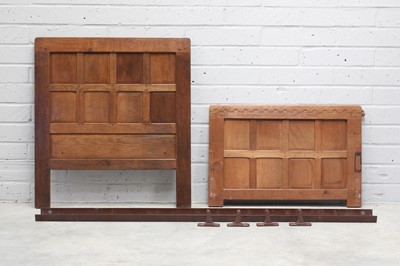 Lot 131 - A pair of Robert 'Mouseman' Thompson oak single beds