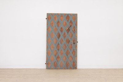 Lot 558 - A painted wooden door panel