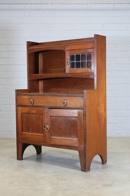 Lot 91 - A Liberty & Co. walnut bookcase