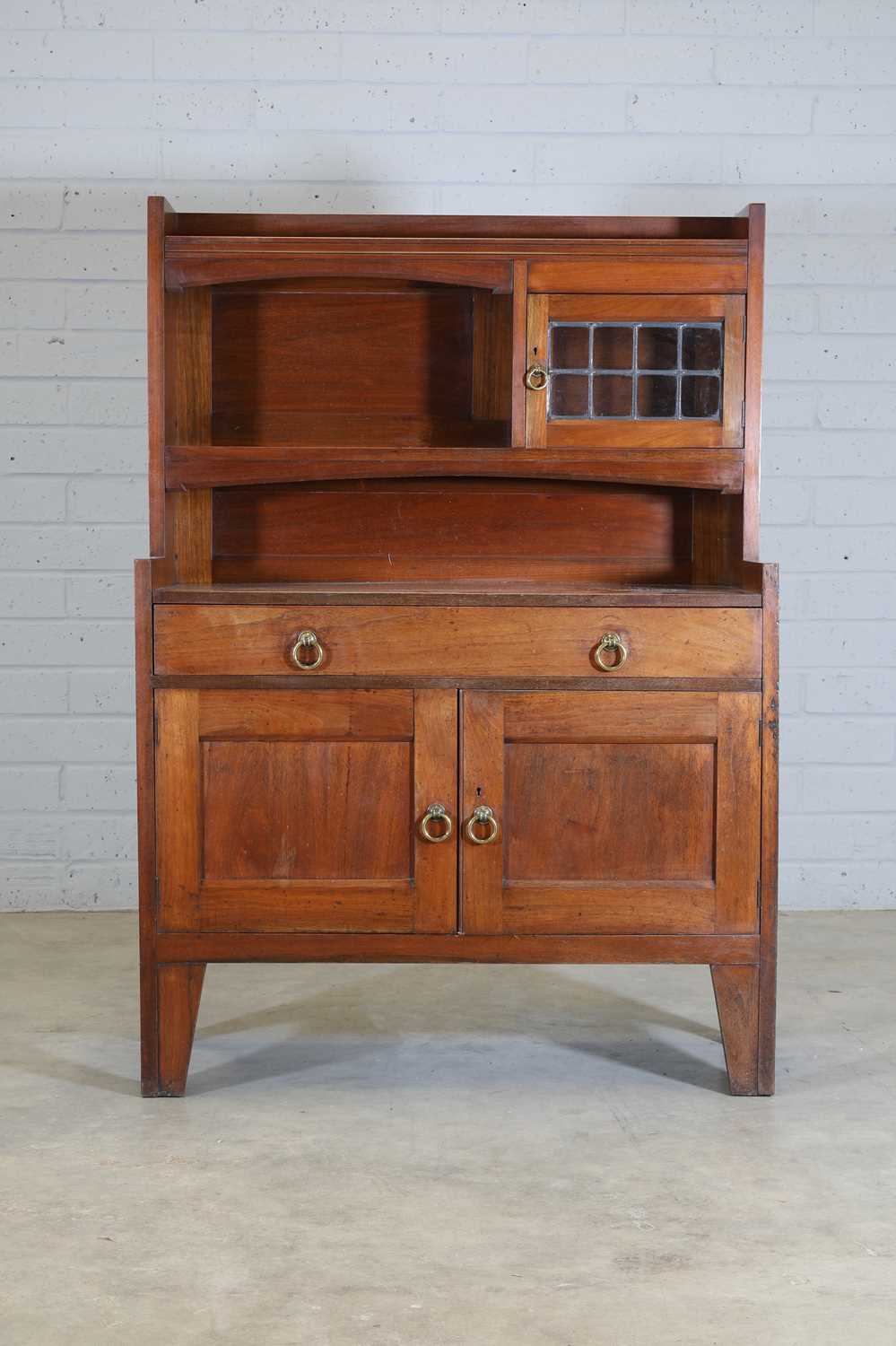 Lot 91 - A Liberty & Co. walnut bookcase