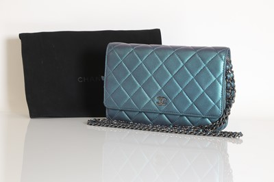 Lot 316 - A Chanel iridescent green timeless cross body wallet