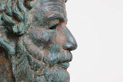 Lot 224 - A patinated bronze head
