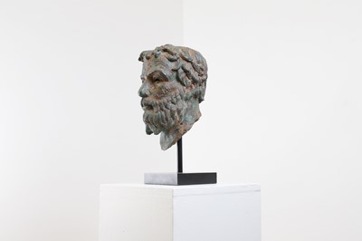 Lot 224 - A patinated bronze head