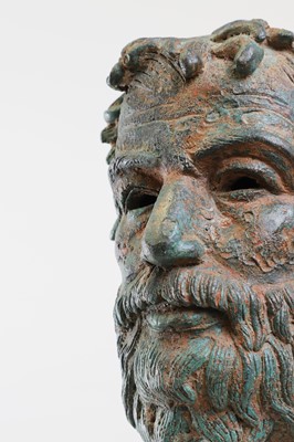 Lot 224 - A patinated bronze head