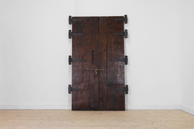 Lot 143 - A pair of carved hardwood doors in the French Louis XV-style