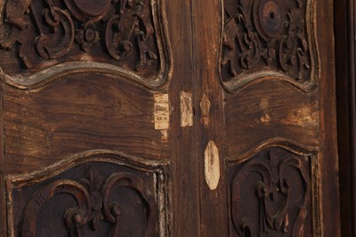 Lot 143 - A pair of carved hardwood doors in the French Louis XV-style
