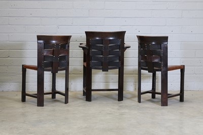 Lot 100 - Three Glasgow School of Arts and Crafts oak and leather chairs