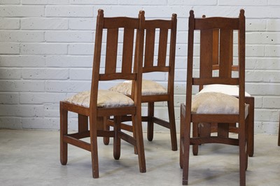 Lot 97 - A set of six Arts and Crafts oak chairs