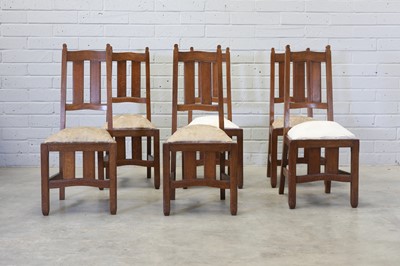 Lot 97 - A set of six Arts and Crafts oak chairs