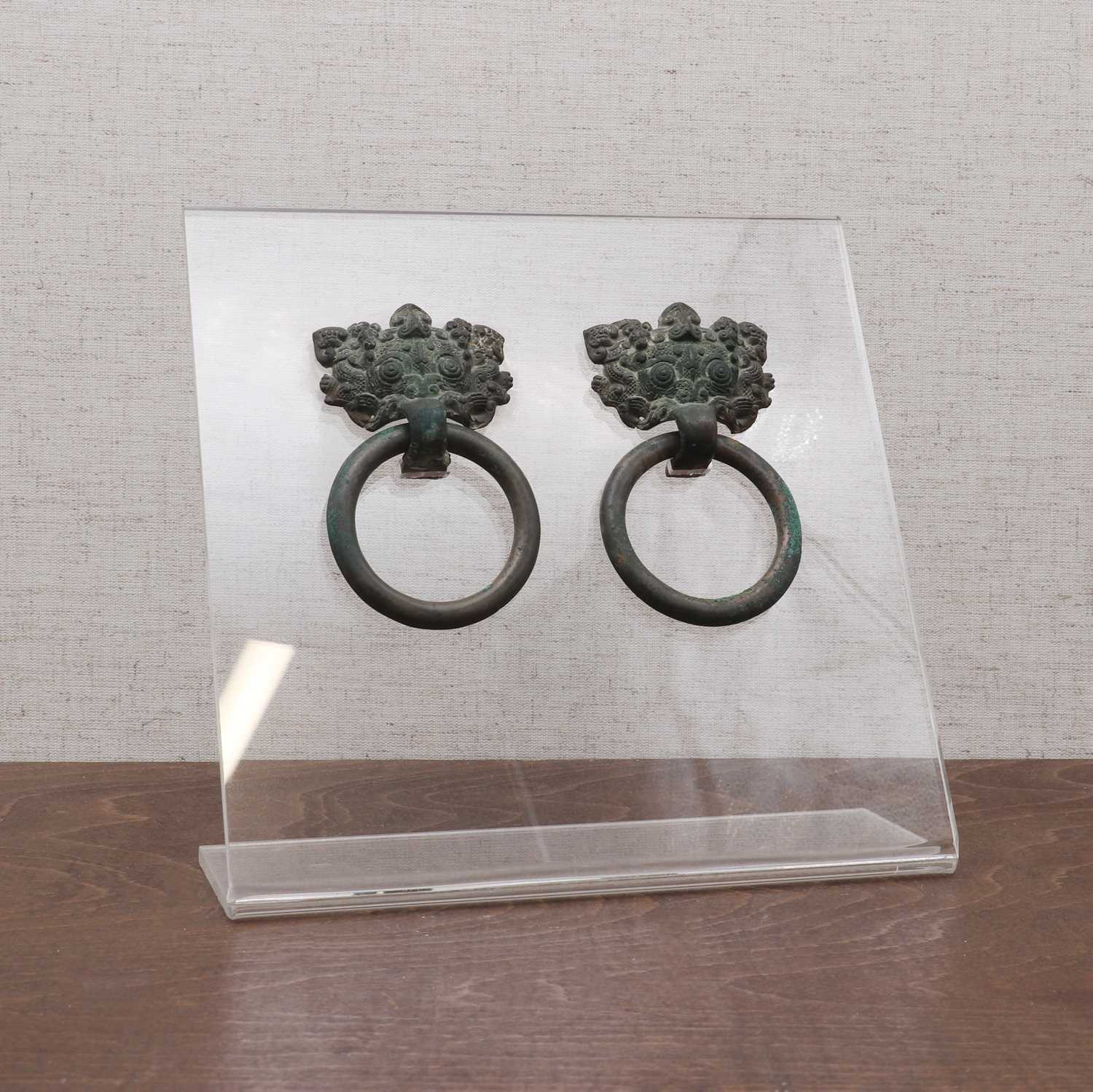 Lot 228 - A pair of Chinese bronze door handles
