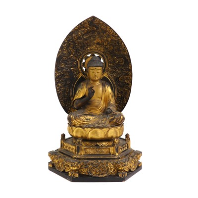 Lot 319 - A Japanese gilt-lacquered wood Buddha