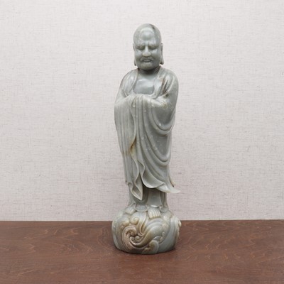 Lot 390 - A Chinese jade figure